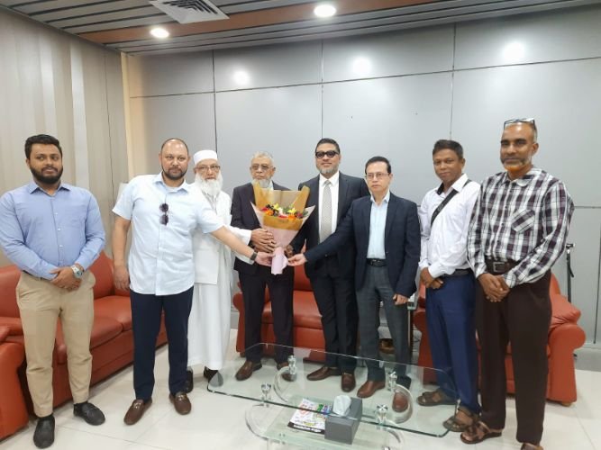 বিচারপতি নজরুল ইসলাম চৌধুরীকে ওসমানী বিমানবন্দরে ফুলেল শুভেচ্ছা